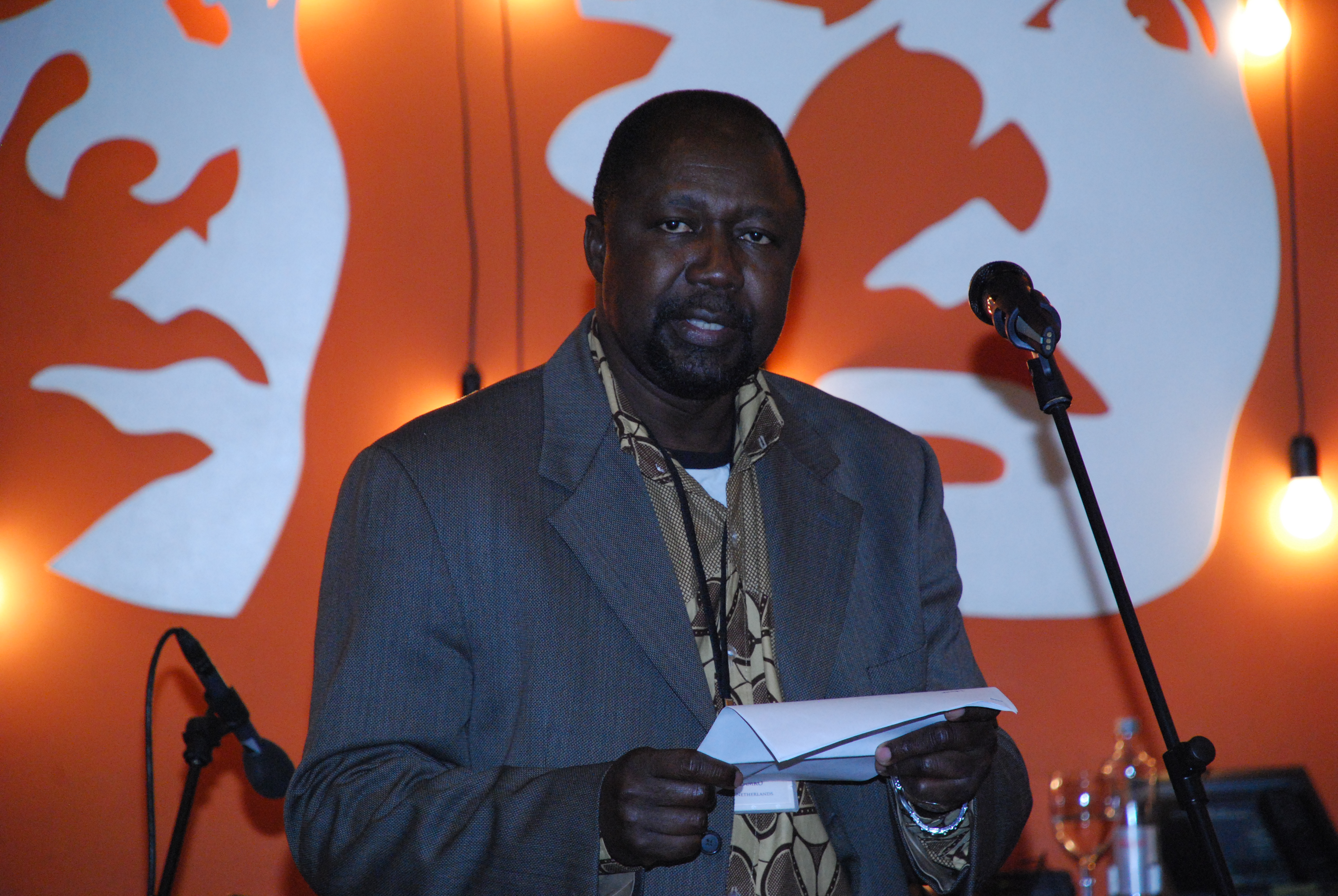 Koulsy Lamko from Chad, Guest Writer in Amsterdam, reading at an event during the General Assembly.