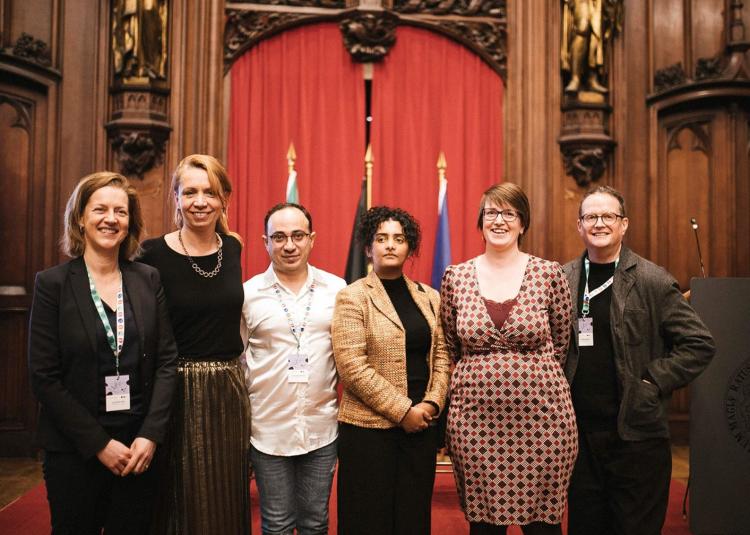 From left to right: Ilke Froyen (Director of Passa Porta), Ans Persoons (Deputy Mayor of Brussels), Vafa Mehraeen (journalist, scholar, activist, current ICORN resident in Brussels), Lucy Kassa (journalist, current ICORN resident in Lund, Sweden), Lies Corneillie (Deputy Mayor of Leuven) and Chris Gribble (ICORN Chair of Board). Photo: Caroline Lessire.
